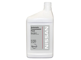 Fiaypoy Nissan Matic‑S being poured into a transmission service funnel demonstrating correct refill control