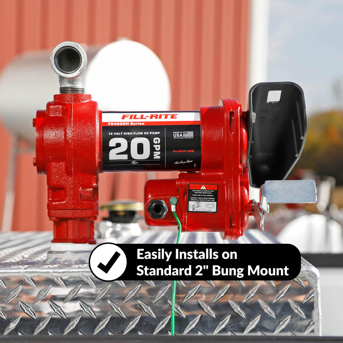 Fill-Rite pump next to a hand for size comparison showing compact portability benefit