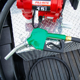 Fill-Rite nozzle size comparison with hand indicating ergonomic grip and scale