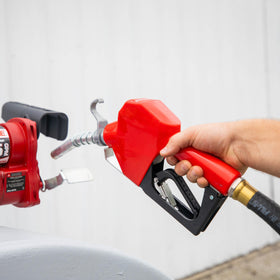 Fill-Rite size comparison with hand to show scale and ergonomic handling benefit