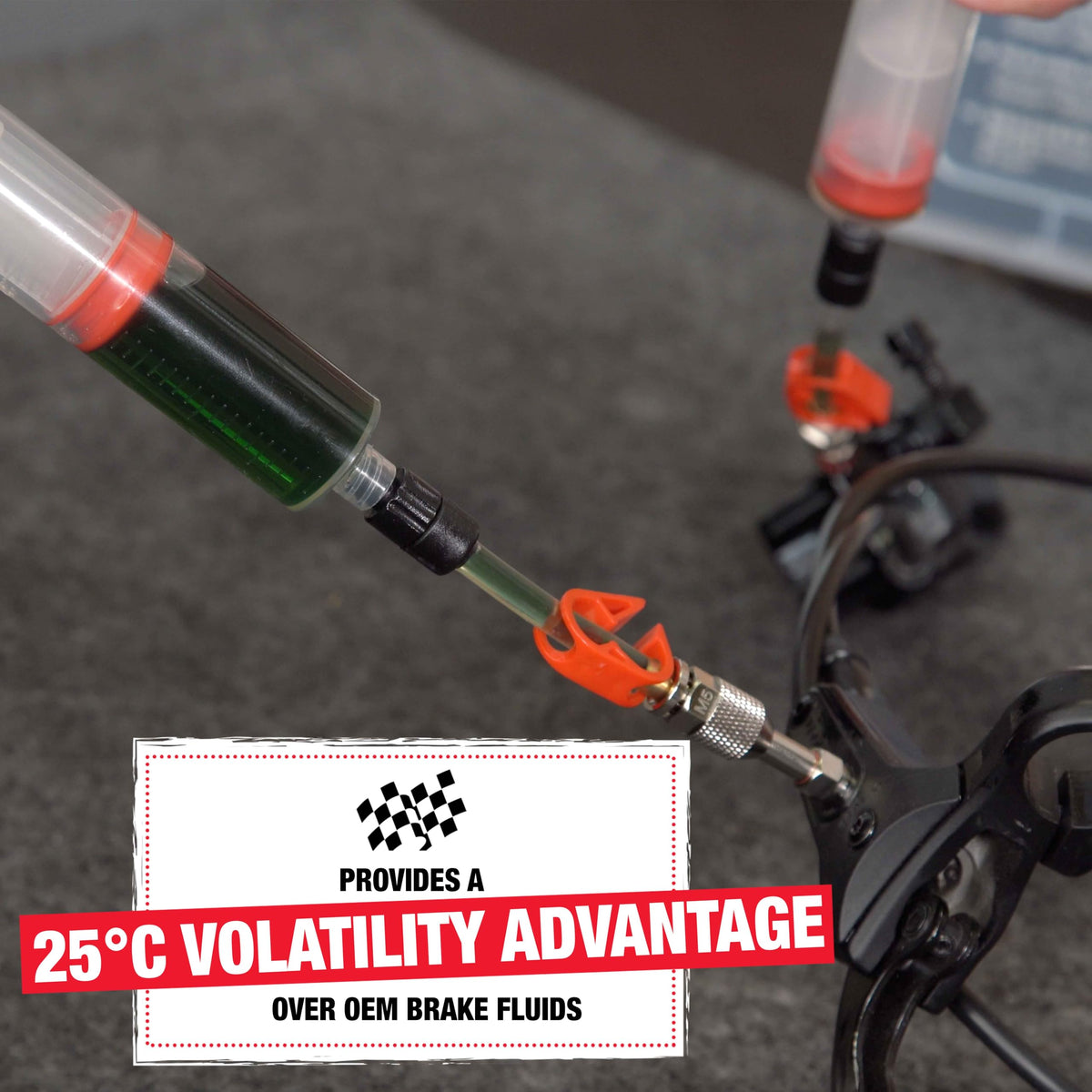 Finish Line mineral oil flowing through brake hose to show compatibility and smooth bleeding