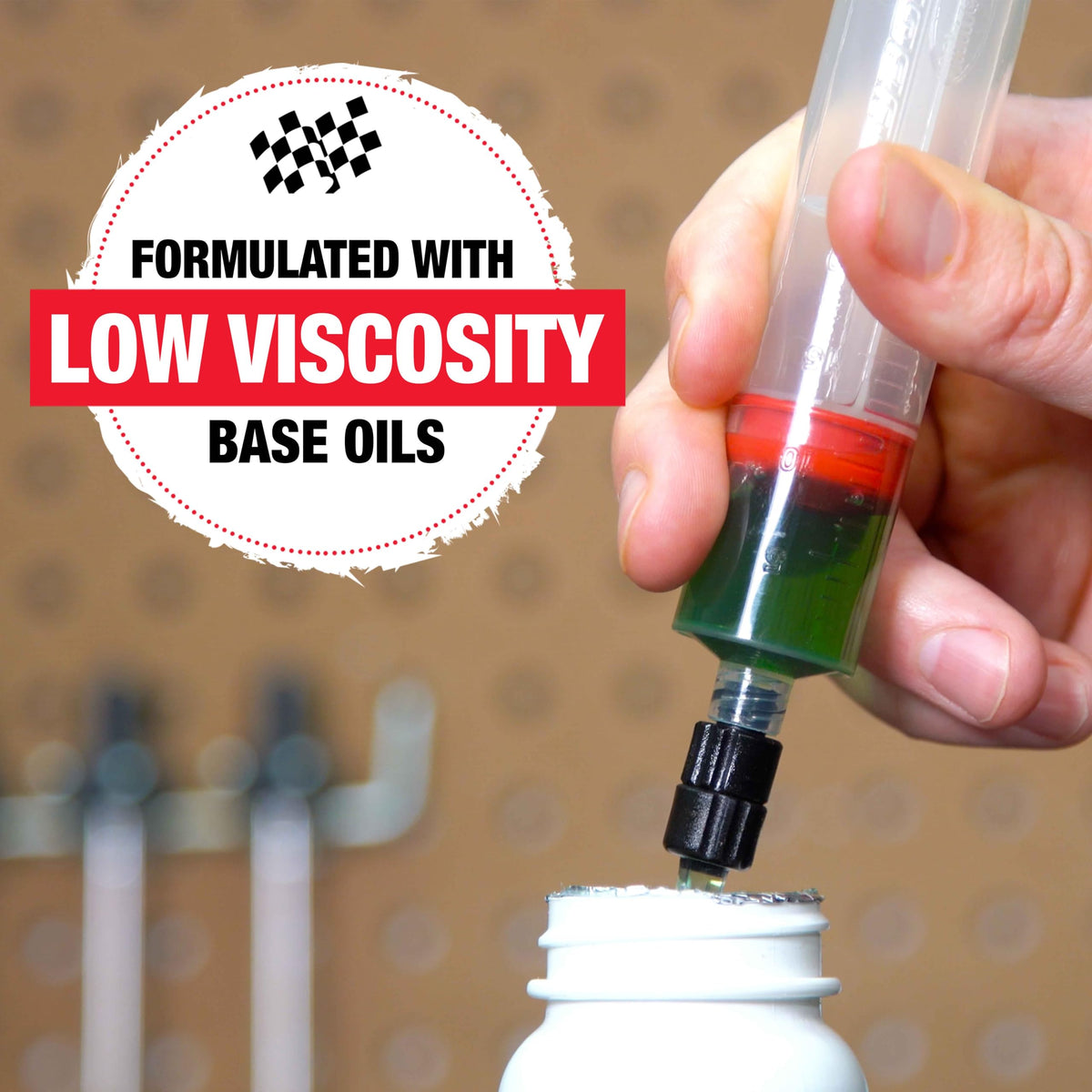 Finish Line pour nozzle detail enabling precise filling and reduced spill risk during bleeds