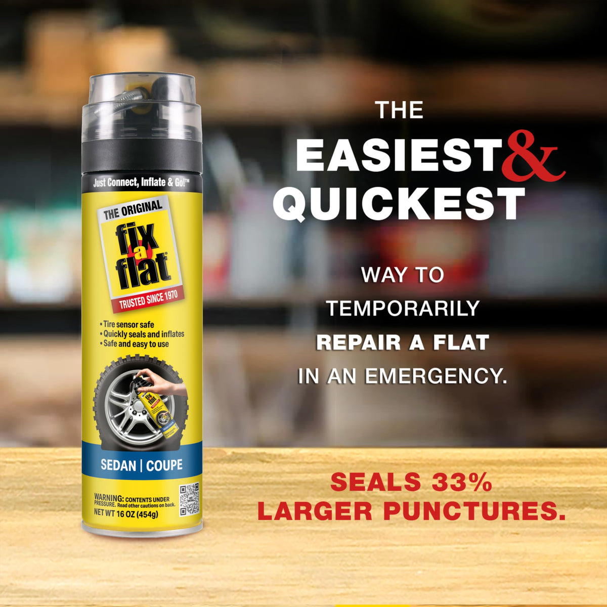 Fix-A-Flat can held in hand to show 16 oz size and portability benefit