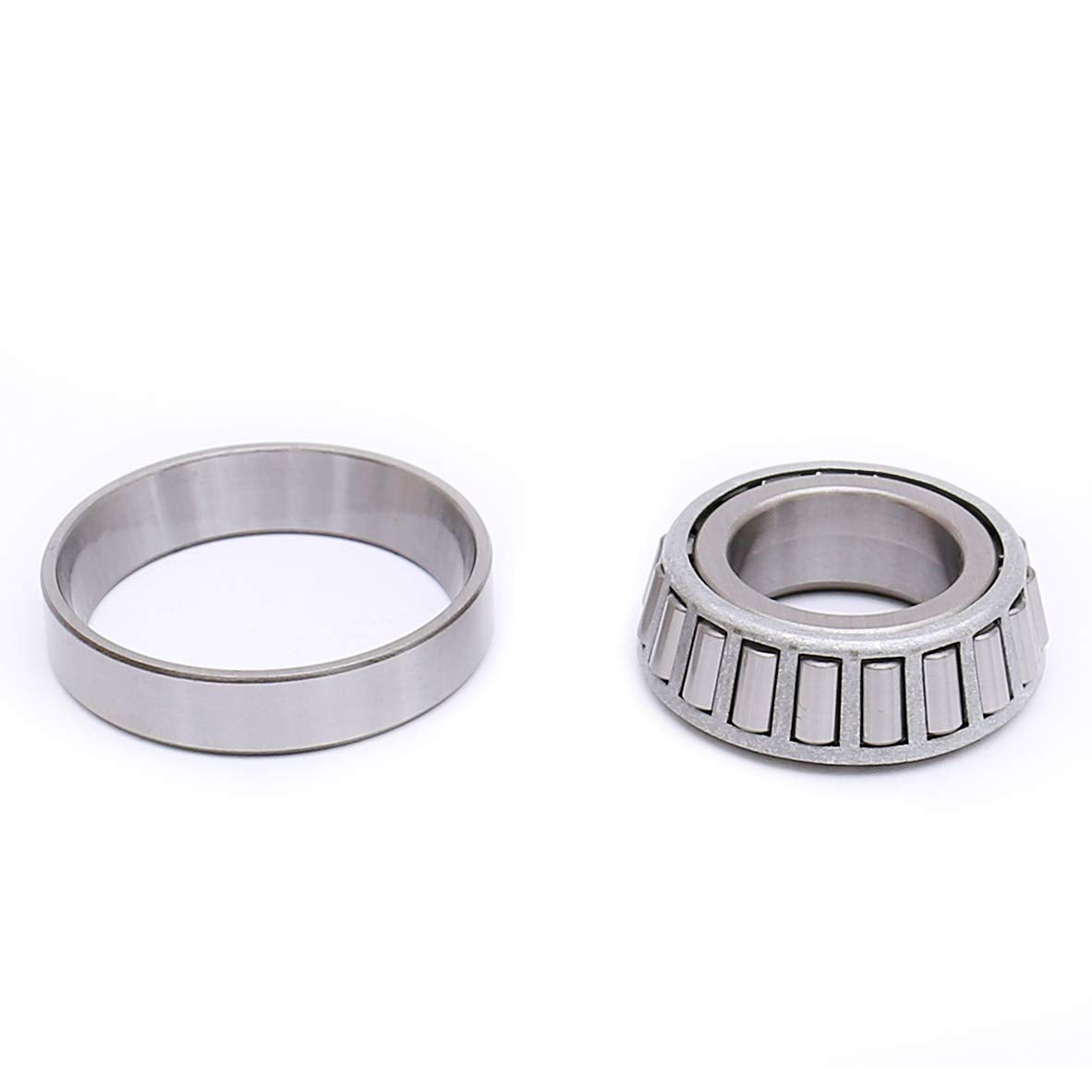 FKG bearing in hand beside ruler illustrating 1.25 inch ID scale