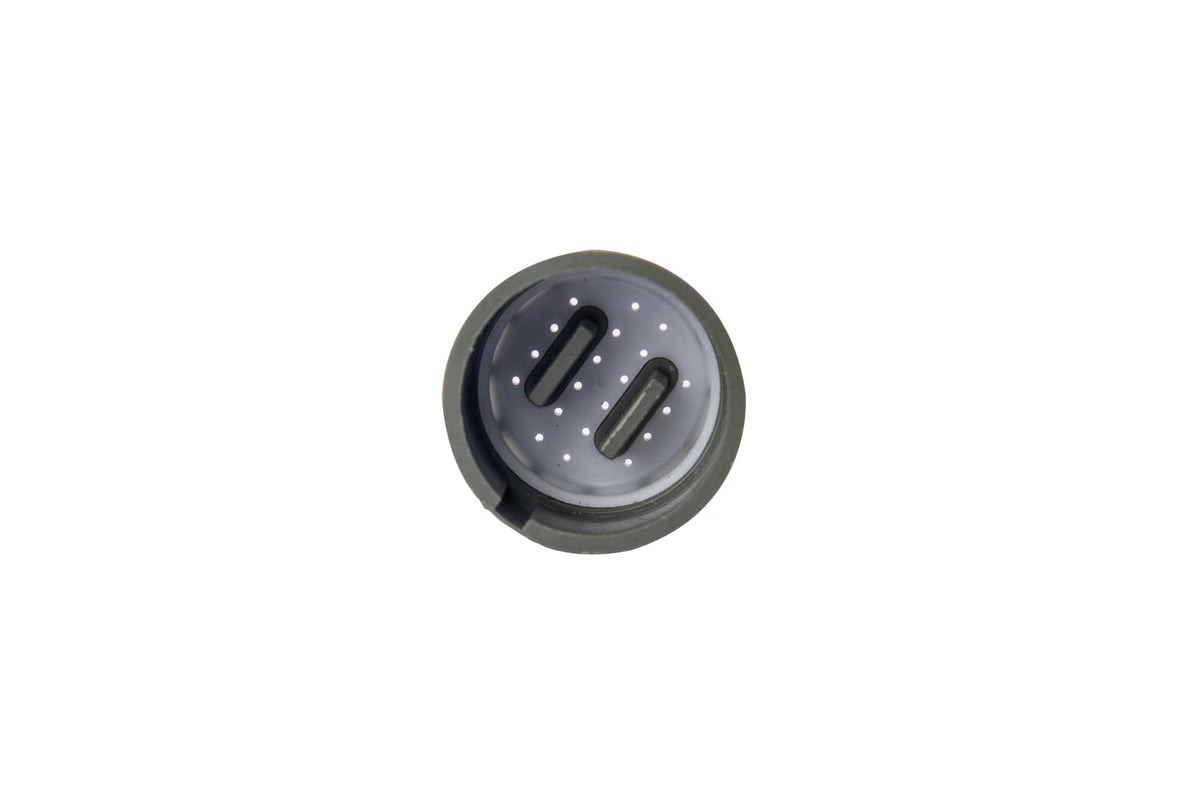 Fleece Performance Engineering seal beside a coin for scale, confirming correct sizing