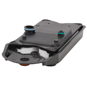 Fleetguard CV52001 filter media closeup capturing oil mist and contaminants