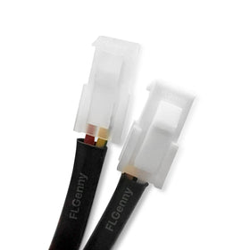 FLGenny module next to ruler showing compact size for easy handling and storage