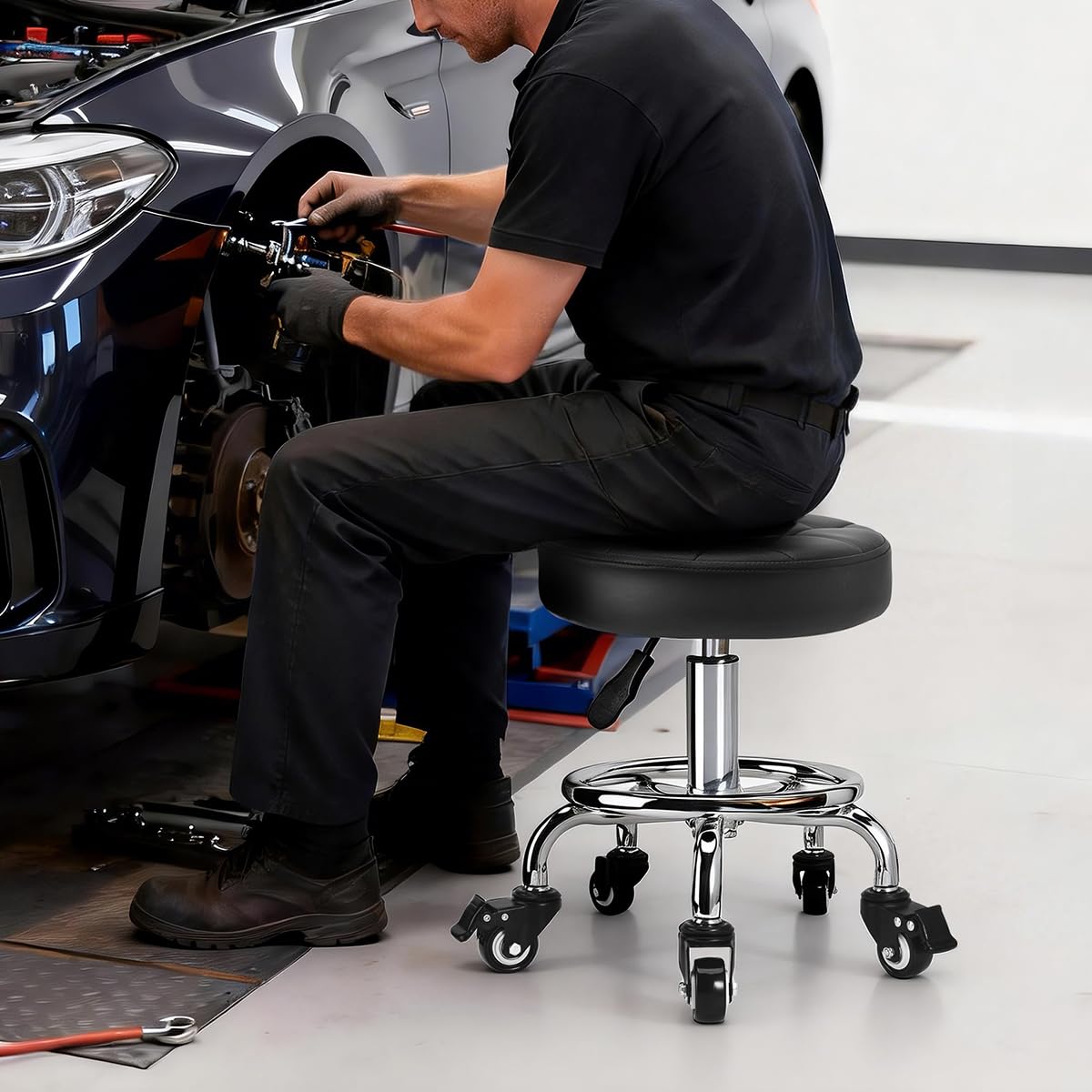 FLOLXNB stool tucked under desk demonstrating space-saving fit