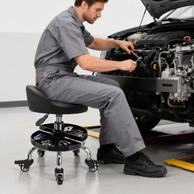 FLOLXNB mechanic stool placed in garage workspace, enhances workshop efficiency