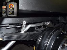 Fluid Film Black being applied to vehicle chassis protecting against rust