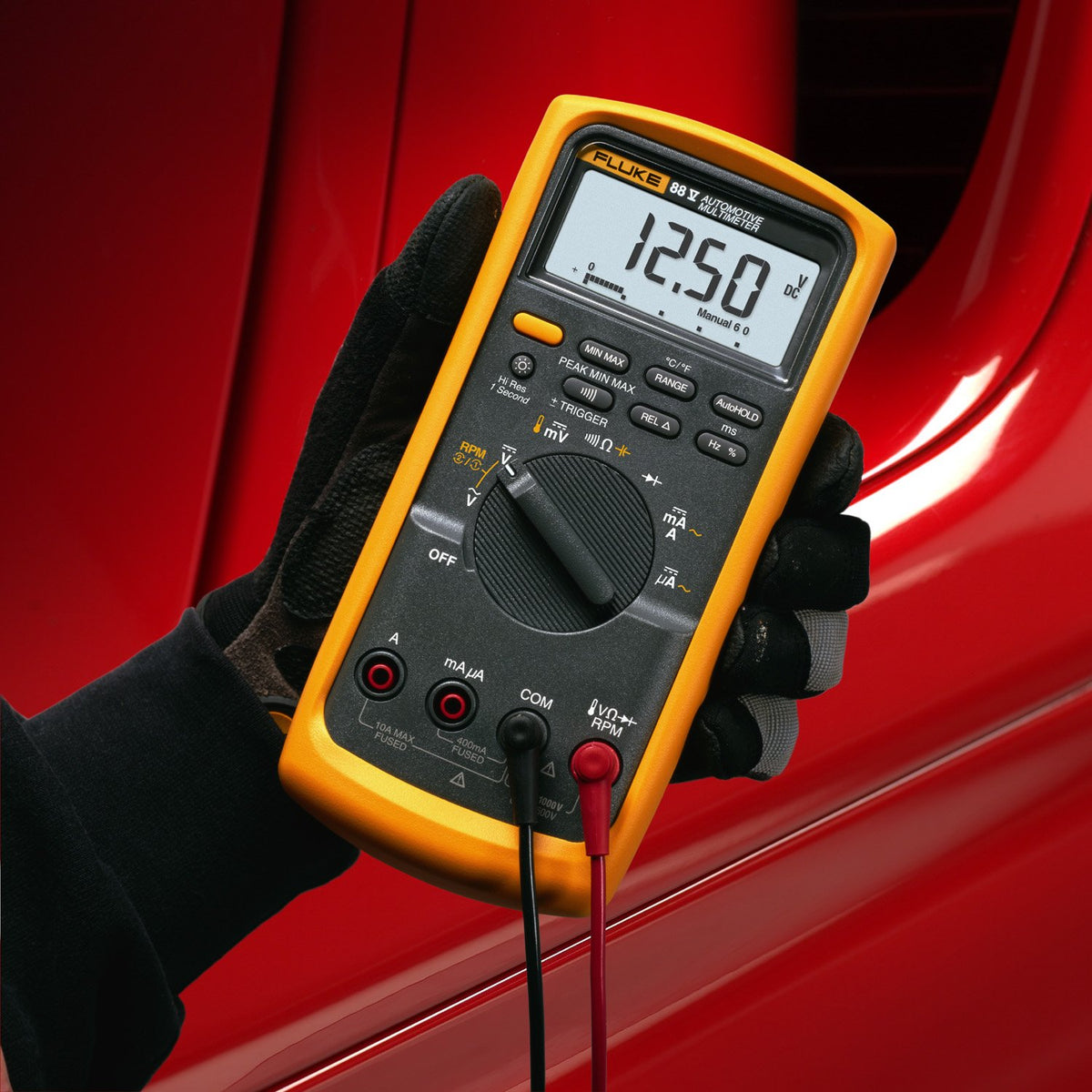 Fluke kit layout with meter and accessories for complete automotive testing convenience