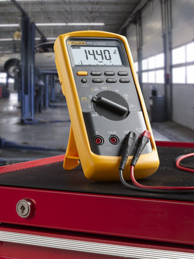 Fluke 88 V/A in use on engine measuring injector pulse and RPM for accurate troubleshooting