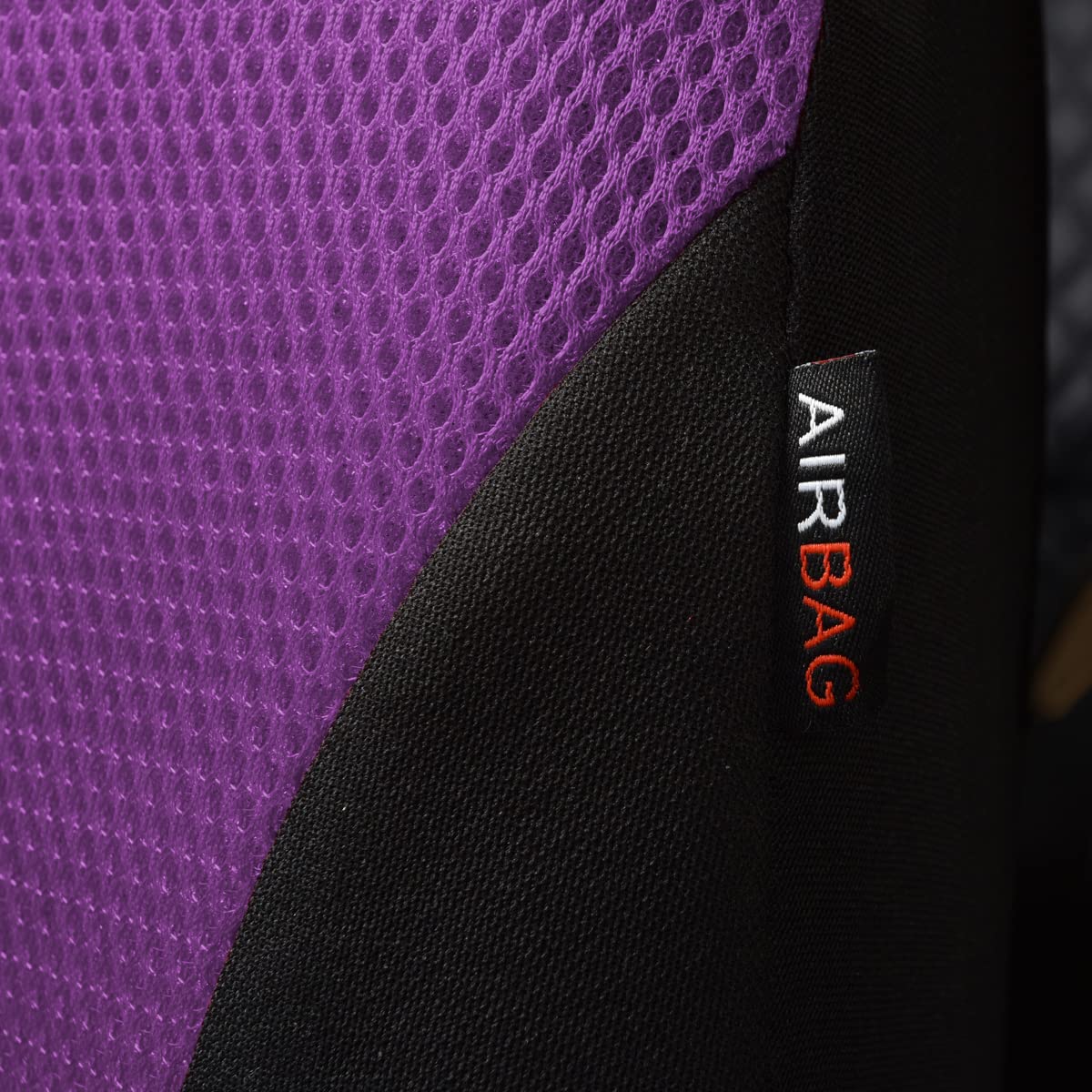 Flying Banner airbag seam close-up preserving vehicle safety