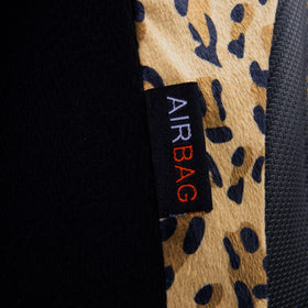 Flying Banner carbon fiber contrast closeup showing durable trim benefit