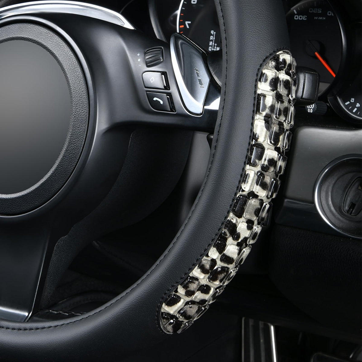 Flying Banner installed on steering wheel demonstrating snug fit and improved grip