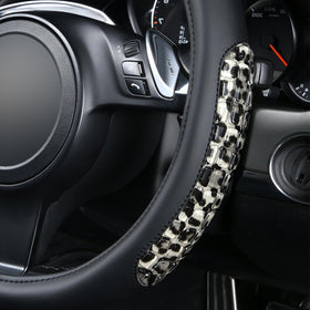 Flying Banner installed on steering wheel demonstrating snug fit and improved grip