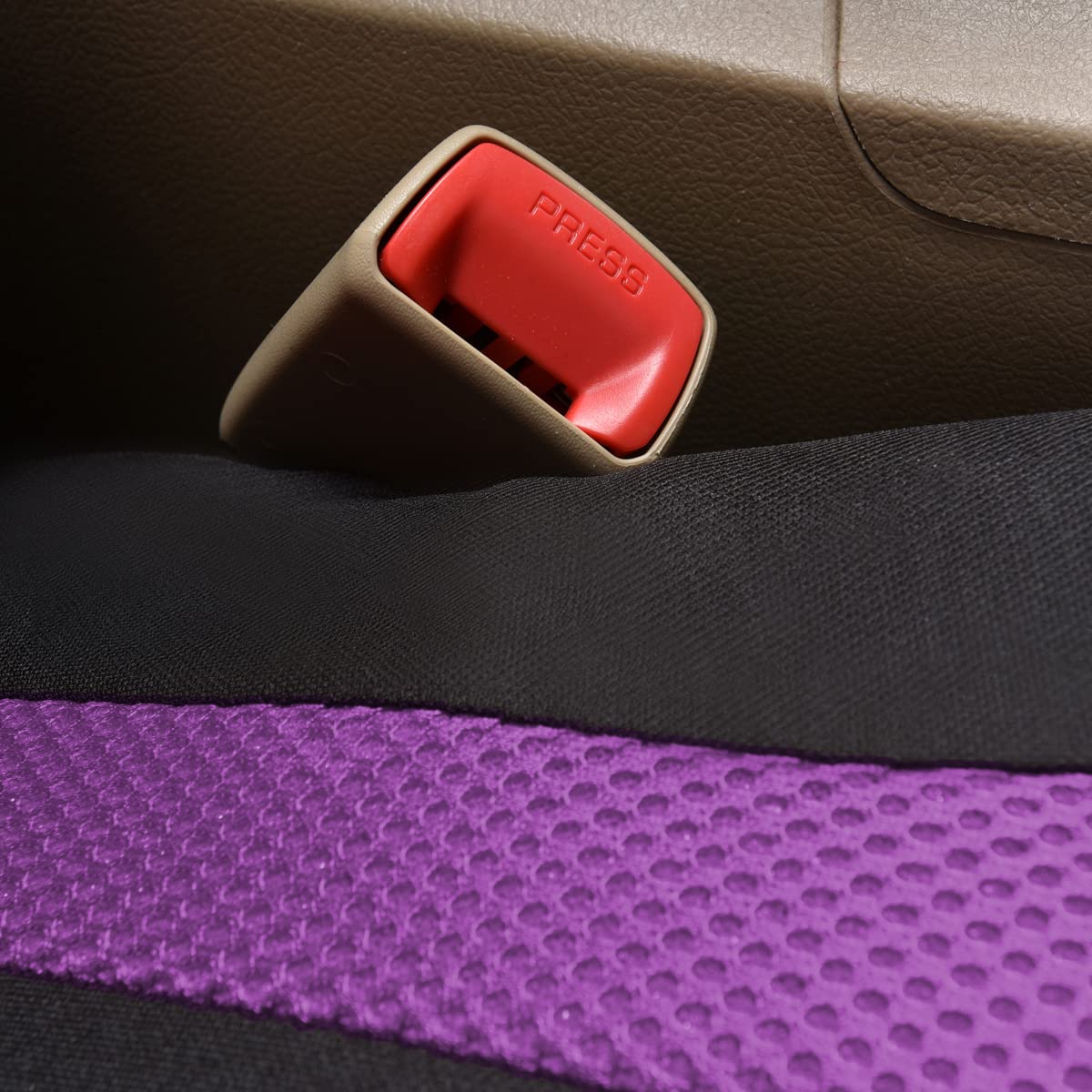 Flying Banner seat cover next to ruler showing accurate sizing