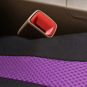 Flying Banner seat cover next to ruler showing accurate sizing