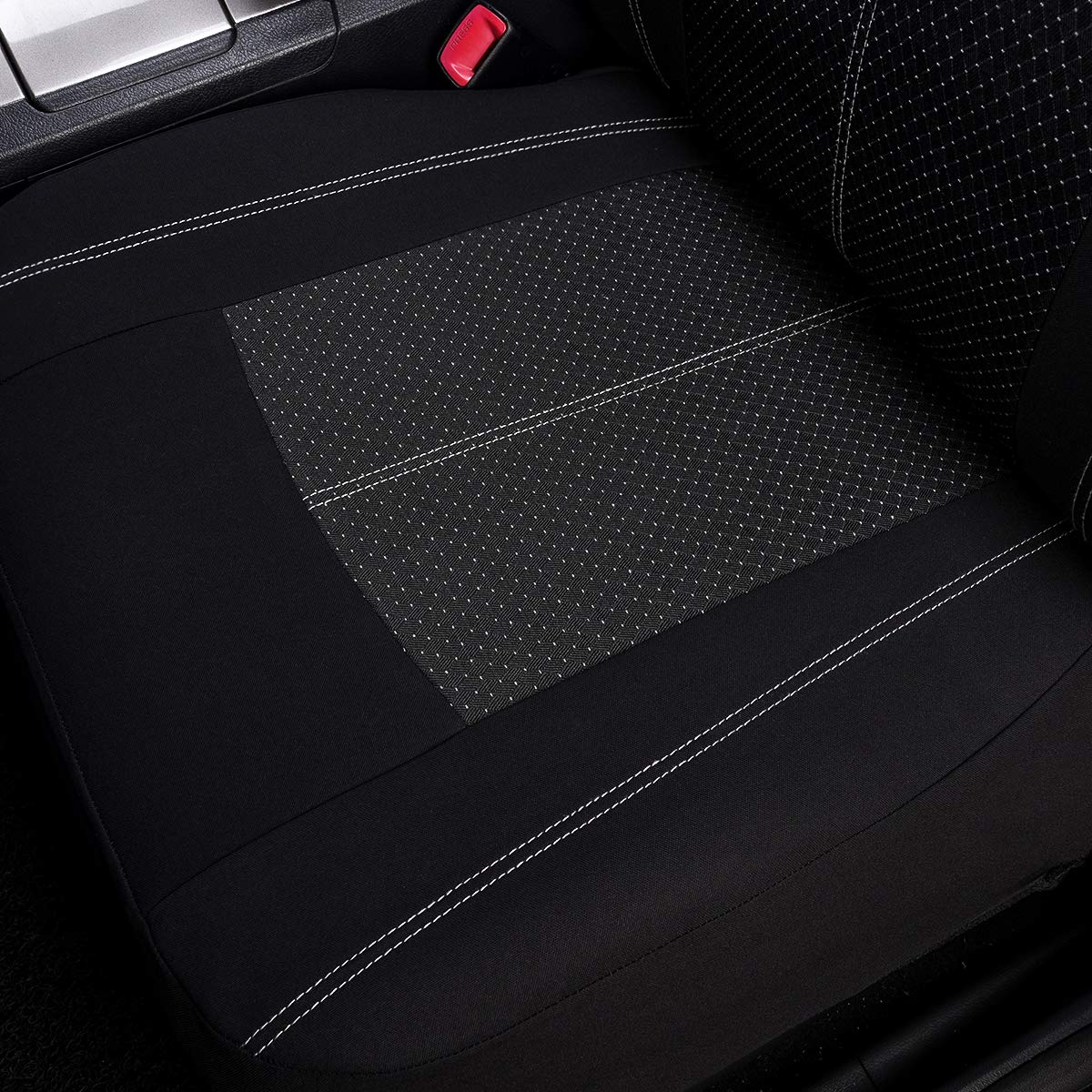Flying Banner hand next to seat cover showing scale and fit clarity
