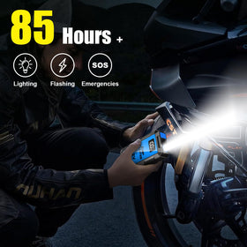 FMOOO LED flashlight in use illuminating roadside scene for night safety