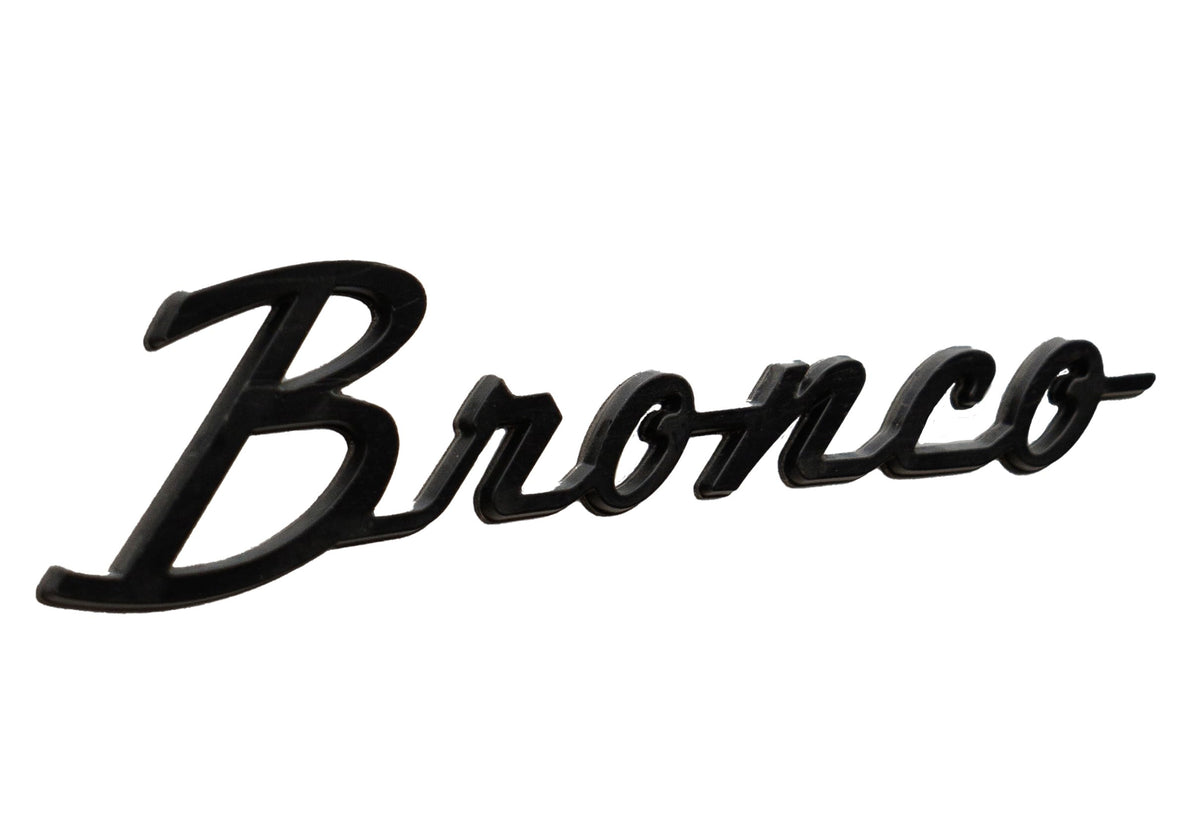 Ford bronco gloss black badge close-up showing texture and finish benefit: durable high-gloss protection