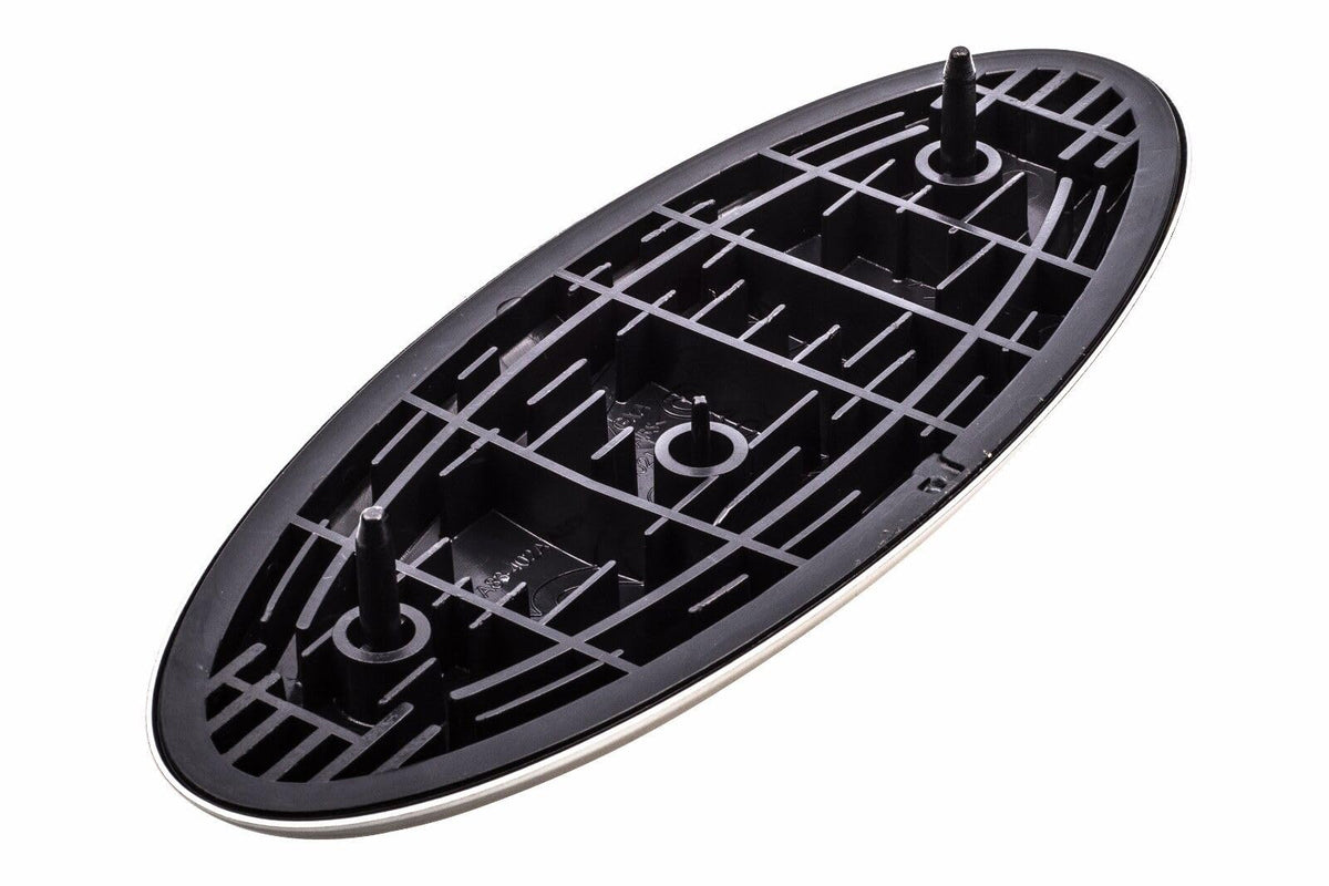 Ford 9-inch emblem installed on Edge grille showing factory appearance benefit