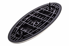 Ford 9-inch emblem installed on Edge grille showing factory appearance benefit