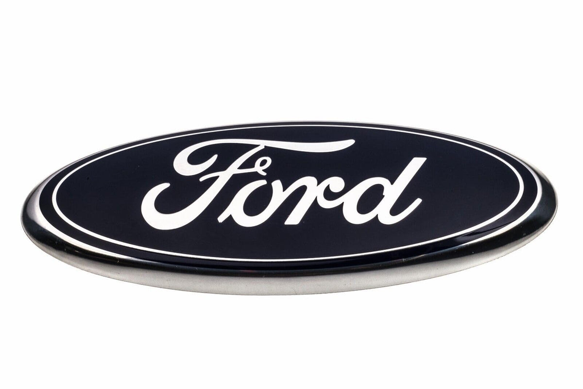 Ford emblem beside ruler displaying 9-inch size for accurate scale verification