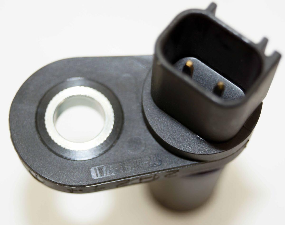 Ford Motorcraft sensor next to ruler showing exact size for correct fit