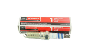 Close-up of Motorcraft SP548 electrode and ceramic insulator showing precise gap and durability