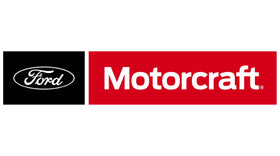 Ford Motorcraft bottle beside pickup truck illustrating genuine OEM compatibility