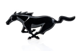Ford black Pony emblem front view showing sleek logo and clean finish