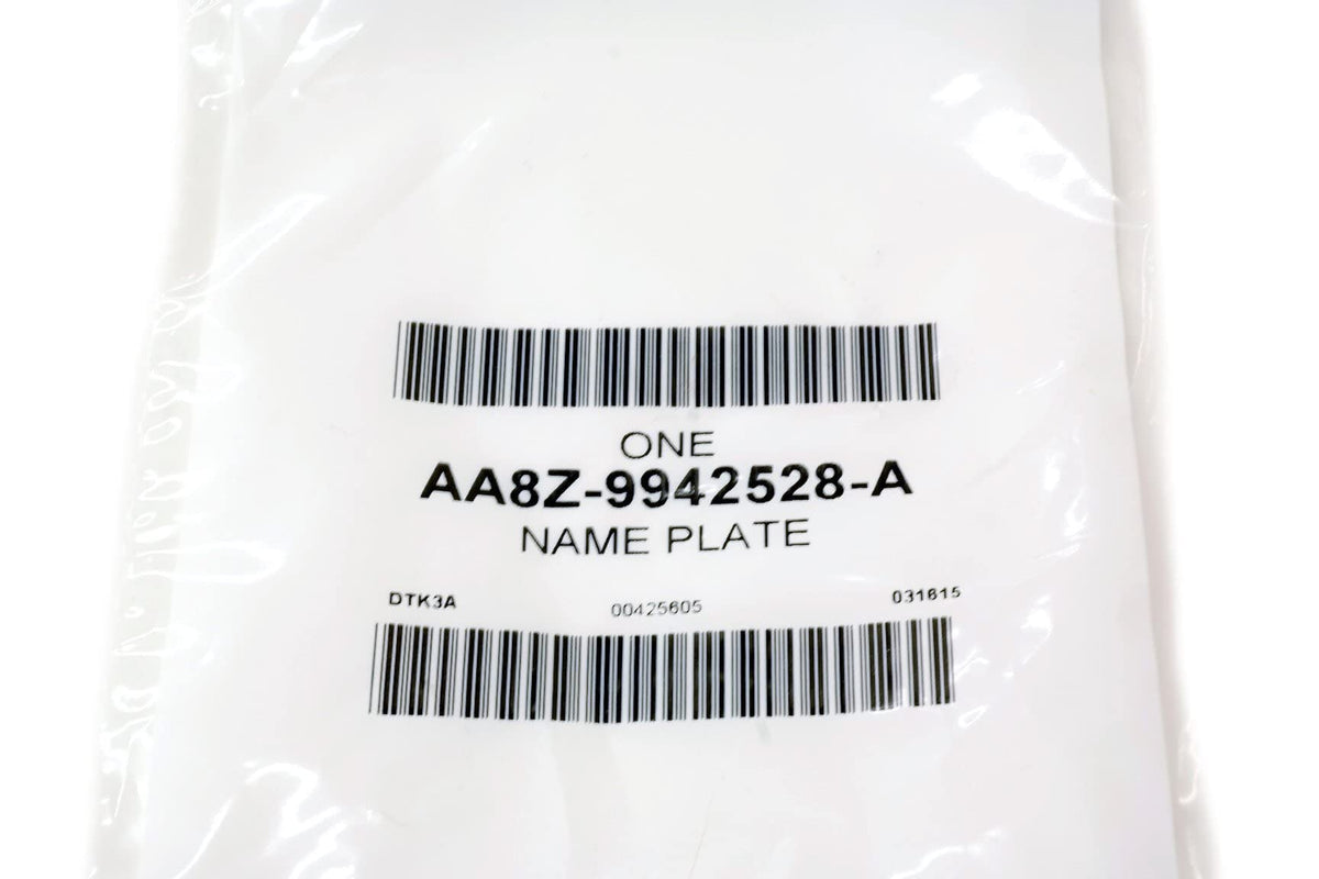 Ford nameplate in packaging with label showing OEM part number for verification