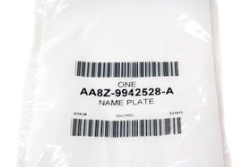 Ford nameplate in packaging with label showing OEM part number for verification