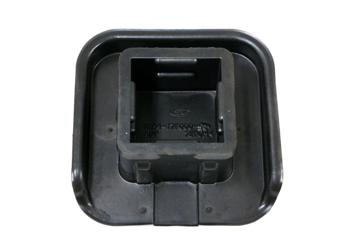 Ford trailer hitch cover installed on vehicle preventing debris entry