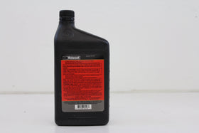 Ford XT-M5-QS close-up of label and fluid pour demonstrating texture and pour control benefit