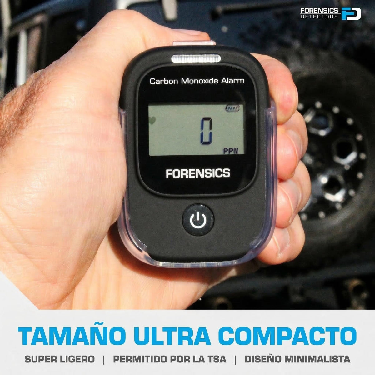 FORENSICS DETECTORS FD next to a coin for size comparison showing small 2oz form factor