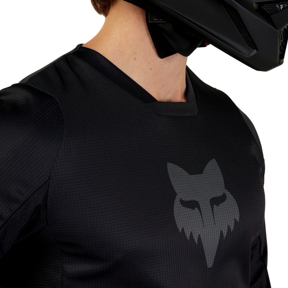 Fox Racing 180 Blackout collar and sleeve cuffs demonstrating comfort and reduced chafe benefit