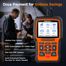 FOXWELL NT510 Elite next to car key to show compact size for home mechanics