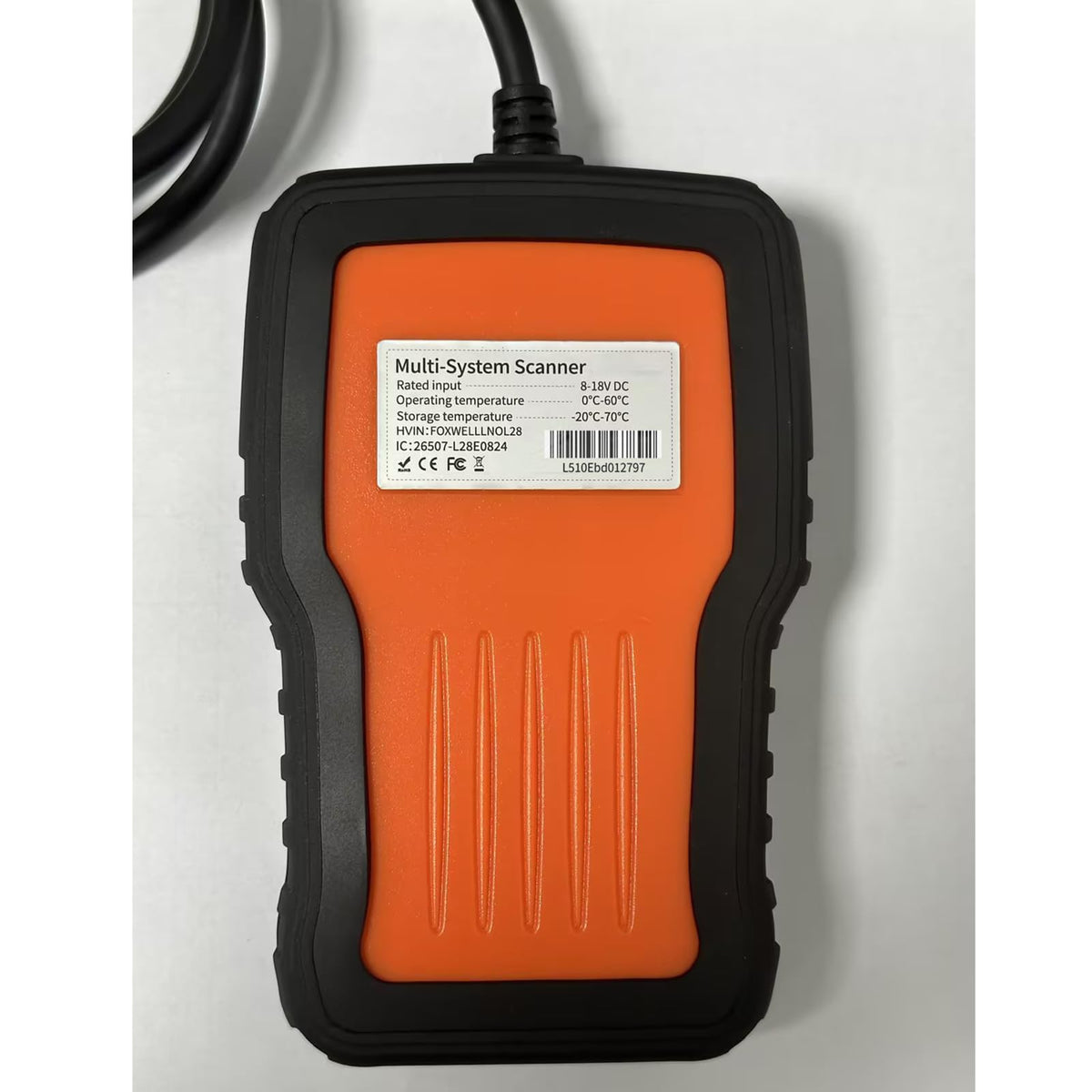 FOXWELL NT510 in a garage setting demonstrating pro-level home repairs