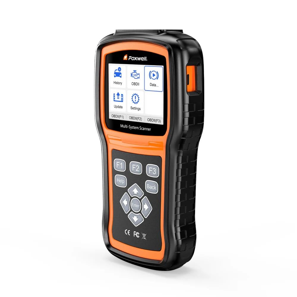 FOXWELL NT530 held next to a smartphone to show compact size and portability benefit
