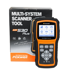 FOXWELL NT530 OBD2 connector cable plugged in, enabling full-system vehicle access