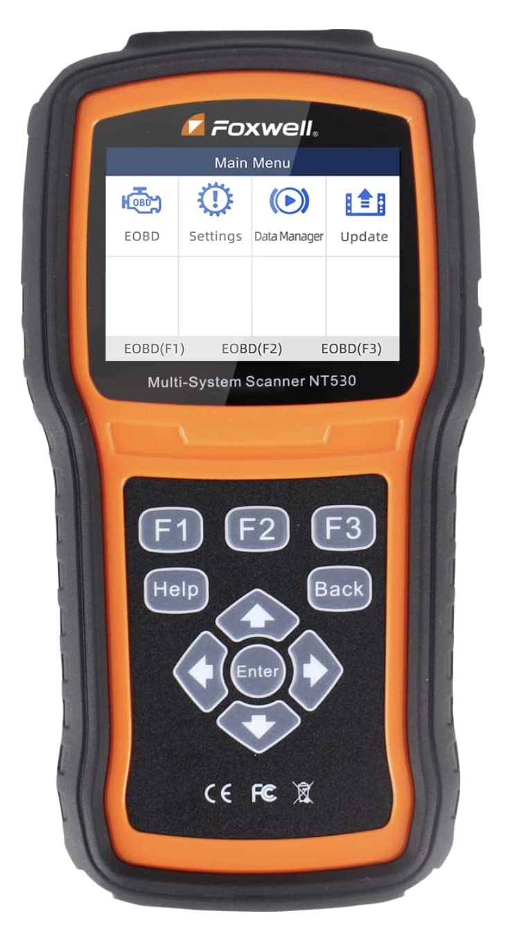 FOXWELL NT530 connected to BMW OBD port diagnosing systems on the car