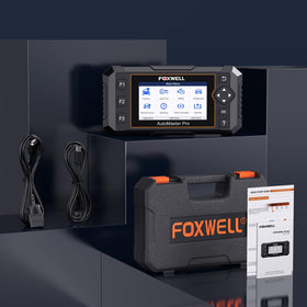 FOXWELL NT614 Elite in a garage lifestyle shot helping DIYers save on diagnostic fees