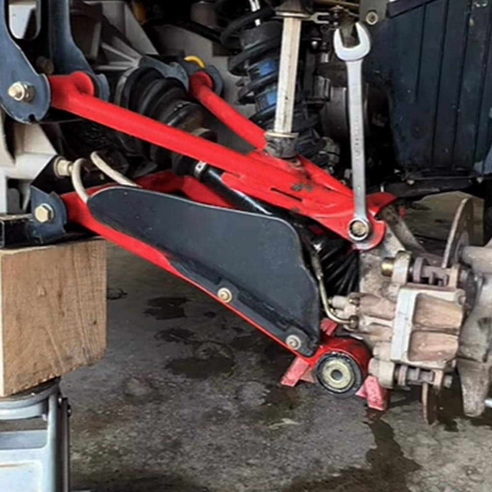 FQRANBO mechanic installing kit on ATV in outdoor shop conveying practical repair and readiness