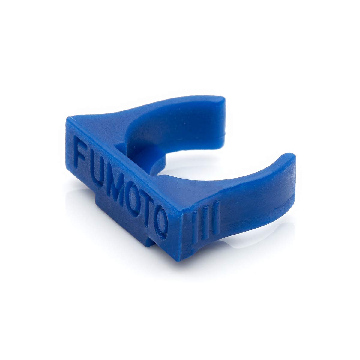 Fumoto F-107SX next to ruler size comparison showing compact dimensions benefit