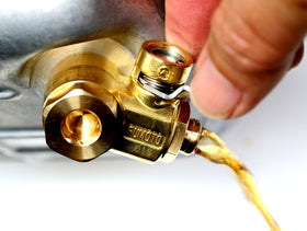 Fumoto F103SX material finish detail highlighting durable metal construction