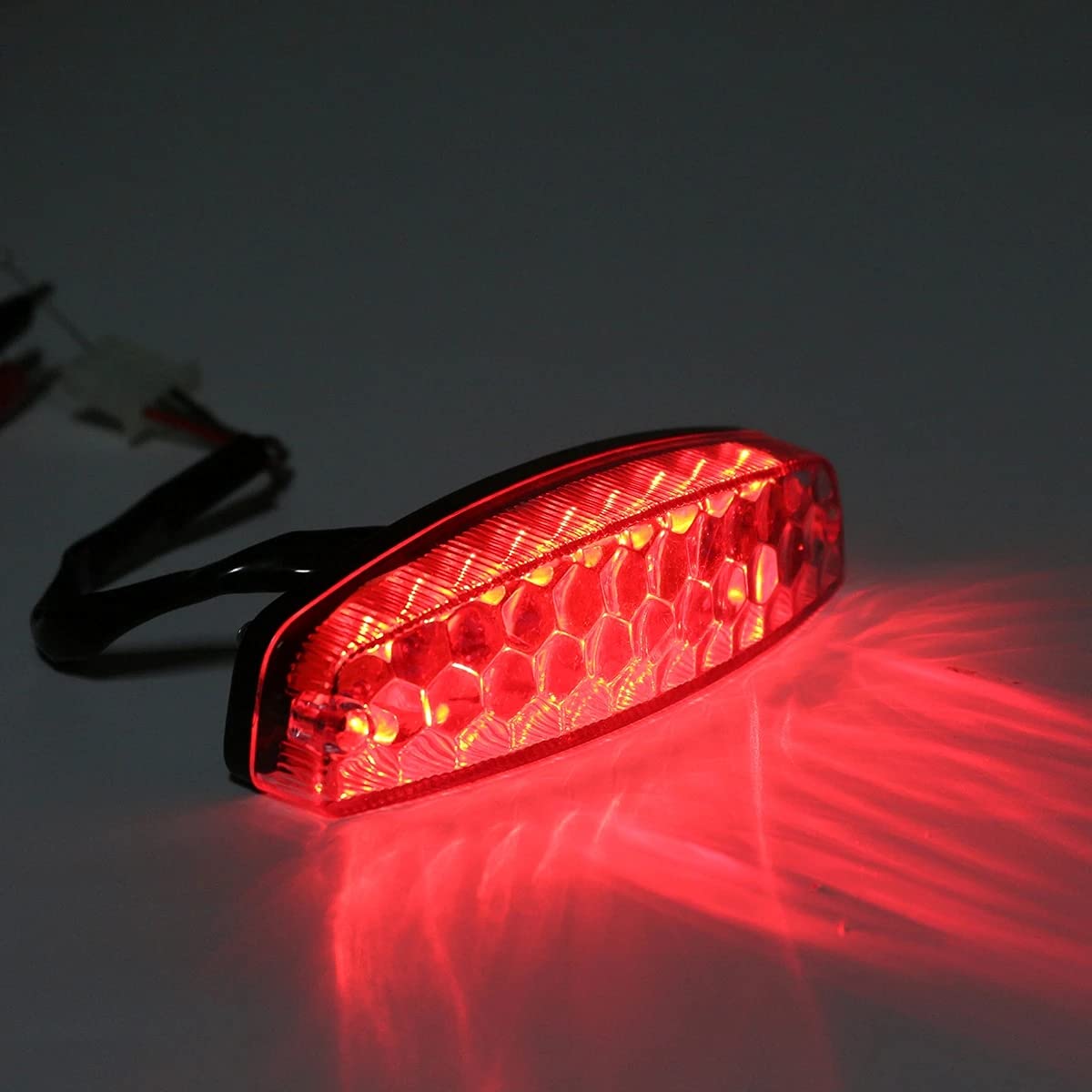 FVRITO tail light mounted on quad showing clear rear signaling benefit