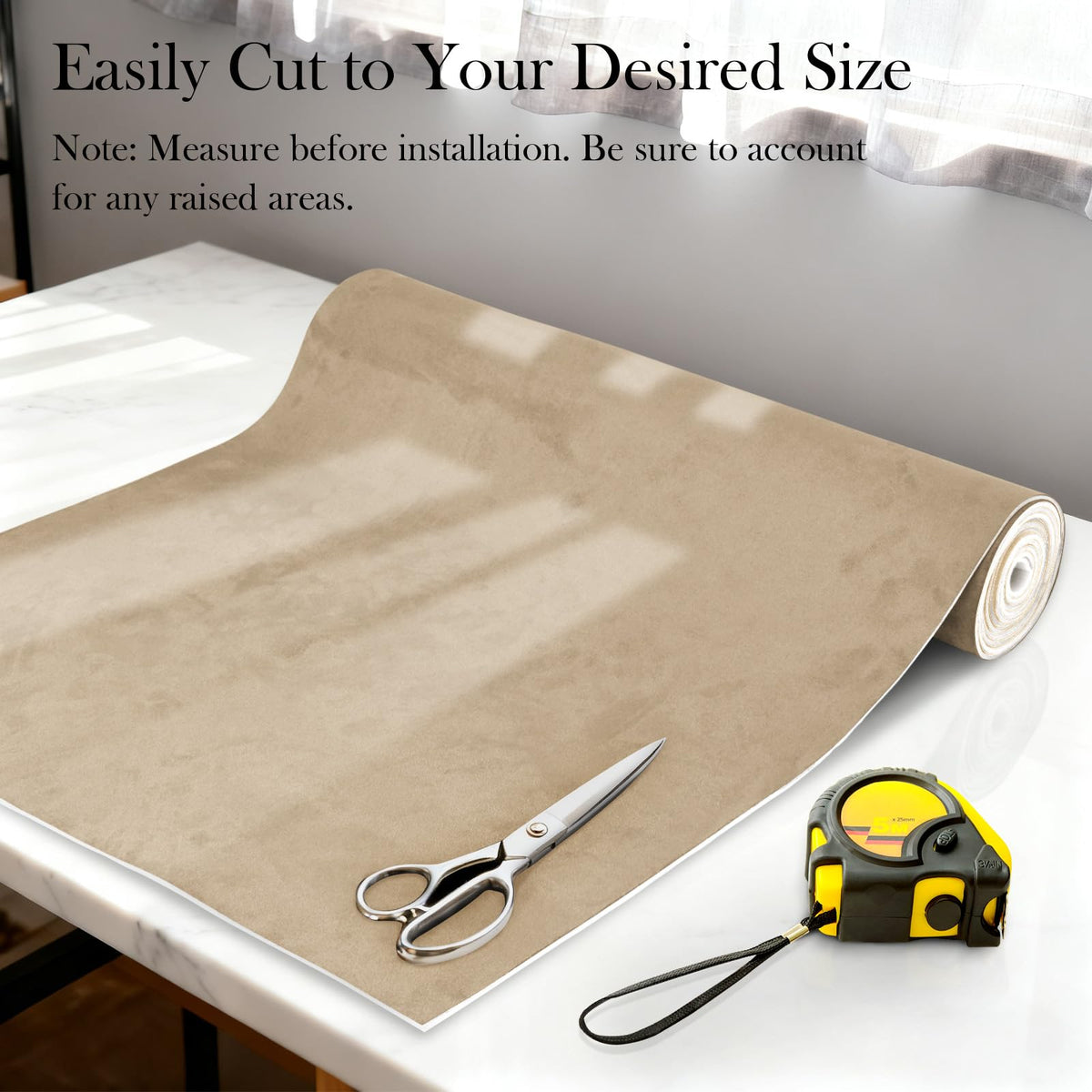 Garifon suede fabric edge close-up revealing 1/8-inch high-density foam backing durability