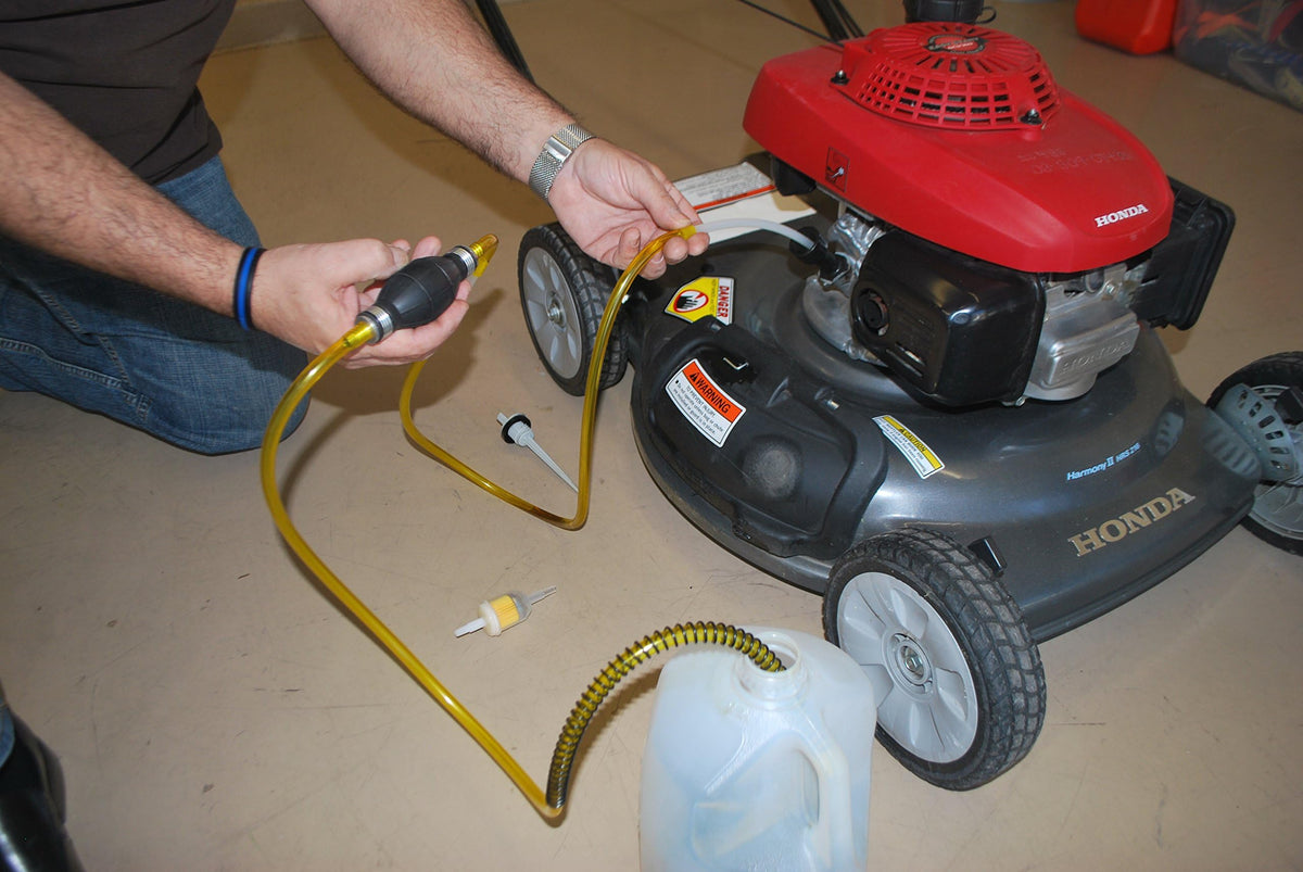 GasTapper hose clip securing hose to reduce spills and mess